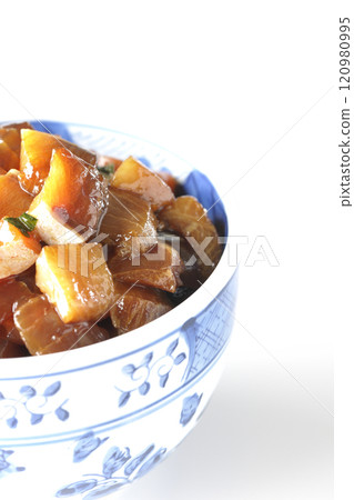 A luxurious, heaping bowl of pickled seafood with plenty of ingredients photographed on a white background 120980995