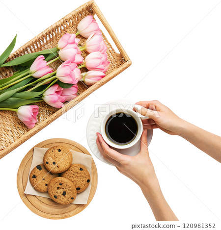 cup of coffee with pink tulips on white background cup of coffee with pink tulips on white background 120981352