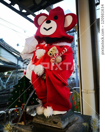 A monument dressed as Santa Claus A monument dressed as Santa Claus 120981634