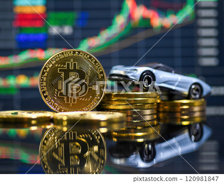 Bitcoin and car model with graph background Bitcoin and car model with graph background 120981847