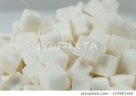 Cubes of white crystalline beetroot refined sugar. Cubes of white crystalline beetroot refined sugar. 120983308