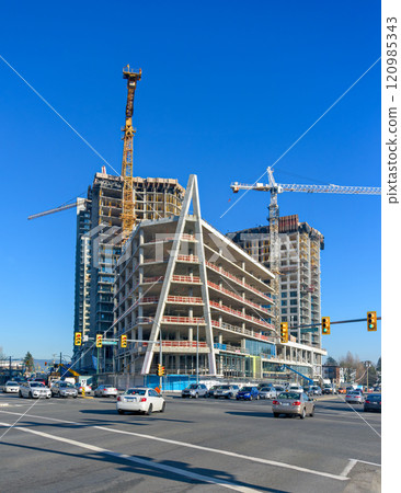 High-rise buildings under constraction on bright sunny winter day 120985343