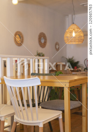 Cozy cafe interior with white chairs Cozy cafe interior with white chairs 120985763