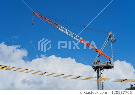 Blue sky, crane and electric wire protection pipe Blue sky, crane and electric wire protection pipe 120987766