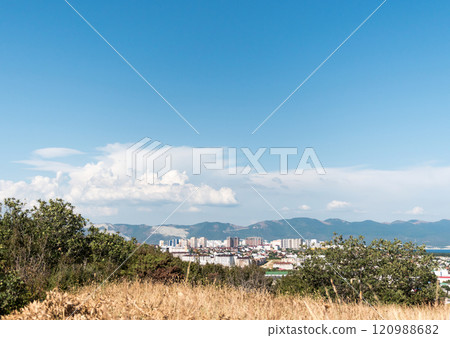 Black sea coast. bald mountain. Beautiful blue sea in Novorossiysk Black sea coast. bald mountain. Beautiful blue sea in Novorossiysk 120988682