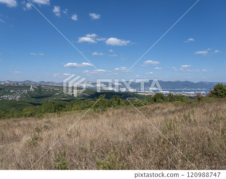 Black sea coast. bald mountain. Beautiful blue sea in Novorossiysk Black sea coast. bald mountain. Beautiful blue sea in Novorossiysk 120988747