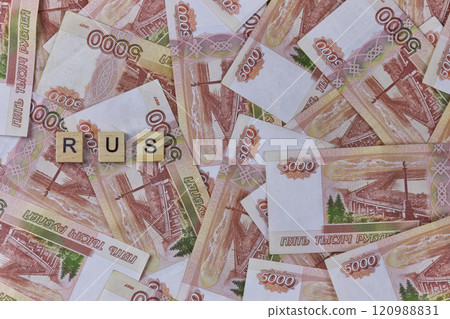 Background of five thousand Russian ruble banknotes with inscription RUS Background of five thousand Russian ruble banknotes with inscription RUS 120988831