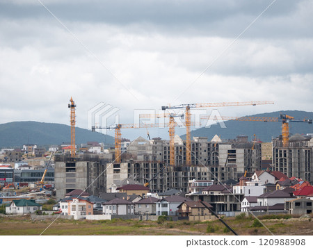 Novorossiysk many hoisting cranes and buildings under construction Novorossiysk many hoisting cranes and buildings under construction 120988908