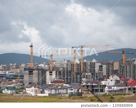 Novorossiysk many hoisting cranes and buildings under construction Novorossiysk many hoisting cranes and buildings under construction 120988909