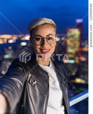 Stylish Non-Binary Person Taking a Nighttime... - Stock Illustration