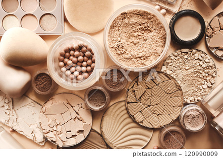 Varieties of face powders and foundations for perfect complexion, basic make up products to even out and matte skin, beauty cosmetics with brushes and sponges, selective focus Varieties of face powders and foundations for perfect complexion, basic make up products to even out and matte skin, beauty cosmetics with brushes and sponges, selective focus 120990009