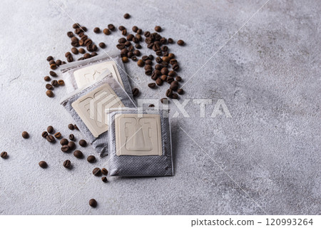 Close-up of drip coffee paper bag Close-up of drip coffee paper bag 120993264
