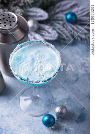 Christmas cocktail with blue curacao Christmas cocktail with blue curacao 120993291