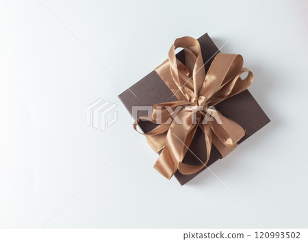 brown gift box with a mocha mousse color satin ribbon bow brown gift box with a mocha mousse color satin ribbon bow 120993502