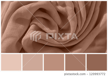 Flowing textile in warm mocha mousse tones, featuring soft drapes and folds 120993772