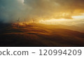 A Majestic Sunset over Beautiful Wind Turbines Located in Rolling Green Hills and Landscape 120994209