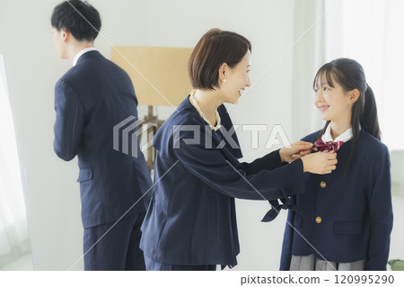 High school girl and her family looking in the mirror High school girl and her family looking in the mirror 120995290