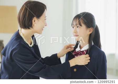High school girl and her family looking in the mirror High school girl and her family looking in the mirror 120995291