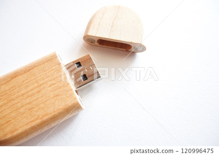 flash disk with a cover made of wood on a white background. flash disk with a cover made of wood on a white background. 120996475