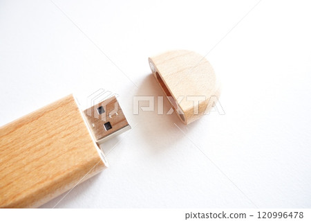flash disk with a cover made of wood on a white background. 120996478