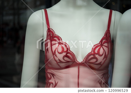Closeup of red nighty on mannequin in a fashion store showroom Closeup of red nighty on mannequin in a fashion store showroom 120996529