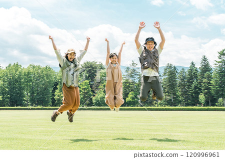 Families enjoying camping and glamping at a campsite 120996961