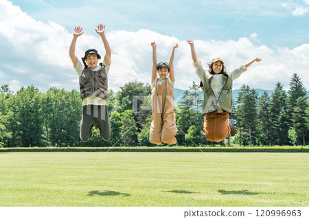 Families enjoying camping and glamping at a campsite 120996963