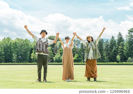 Families enjoying camping and glamping at a campsite 120996968