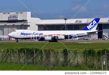 NCAcargo 747 airplane taxiing on hill NCAcargo 747 airplane taxiing on hill 120998273