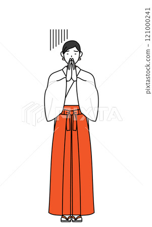 A shrine maiden in a white robe and scarlet hakama apologizing with her hands together in front of her A shrine maiden in a white robe and scarlet hakama apologizing with her hands together in front of her 121000241