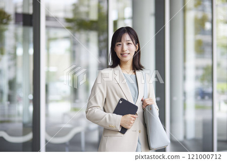 Smiling Japanese business woman in a suit 121000712