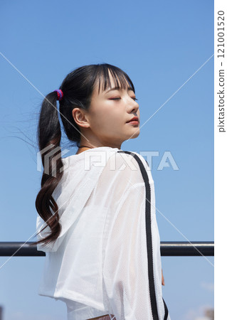 Casual and fashionable portrait of a young woman taken outdoors Casual and fashionable portrait of a young woman taken outdoors 121001520