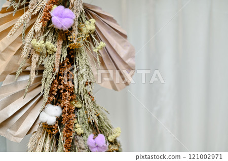 decoration made of dried flowers and paper. copy space 121002971
