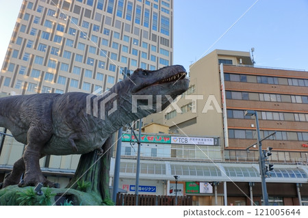 Animatronic robot dinosaur statues at Fukui train and bus stations in Fukui City in Japan 121005644