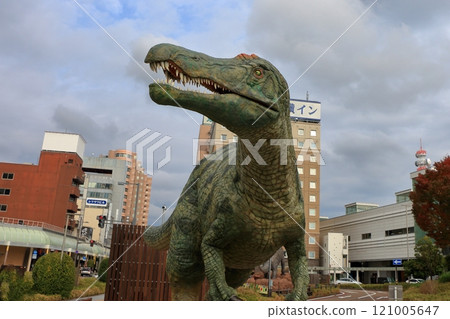 Animatronic robot dinosaur statues at Fukui train and bus stations in Fukui City in Japan 121005647