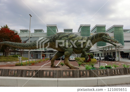 Animatronic robot dinosaur statues at Fukui train and bus stations in Fukui City in Japan 121005651
