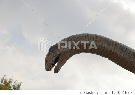 Animatronic robot dinosaur statues at Fukui train and bus stations in Fukui City in Japan 121005659