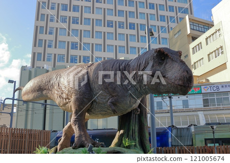 Animatronic robot dinosaur statues at Fukui train and bus stations in Fukui City in Japan 121005674