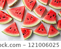 Freshly sliced watermelon pieces with visible seeds, showcasing vibrant red flesh and green rind, perfect for summer enjoyment 121006025