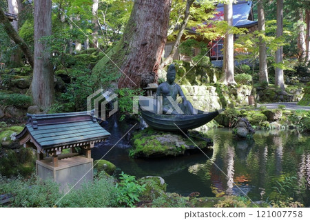 Statue of Avalokitesvara on a boat made from a leaf from the vision of Zen Master Dogen Zenji near the entrance to Daihonzan Eiheiji Temple near Fukui Japan 121007758