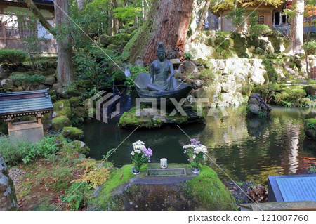 Statue of Avalokitesvara on a boat made from a leaf from the vision of Zen Master Dogen Zenji near the entrance to Daihonzan Eiheiji Temple near Fukui Japan 121007760