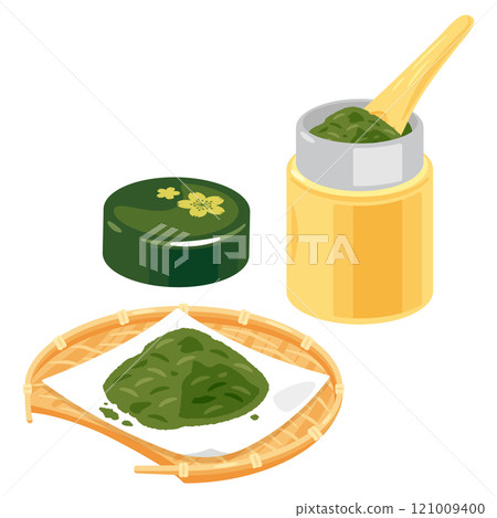 Green tea leaves in a colander and a tea caddy 121009400