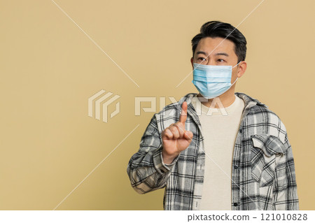 Asian man wearing medical mask on face protection safety allergy flu pneumonia virus disease asthma Asian man wearing medical mask on face protection safety allergy flu pneumonia virus disease asthma 121010828
