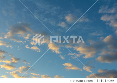 Ornamental clouds. Dramatic sky. Epic storm cloudscape Soft sunlight. Panoramic image texture background graphic resources design Meteorology, heaven hope peace concept Ornamental clouds. Dramatic sky. Epic storm cloudscape Soft sunlight. Panoramic image texture background graphic resources design Meteorology, heaven hope peace concept 121012066