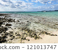 A calm coastline with rocks and crystal clear waters 121013747