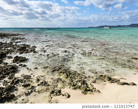 A calm coastline with rocks and crystal clear waters A calm coastline with rocks and crystal clear waters 121013747