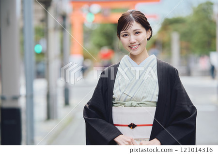 A woman in a kimono 121014316