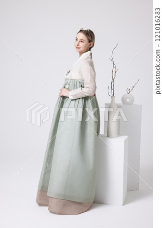 A foreign woman wearing traditional Korean hanbok 121016283