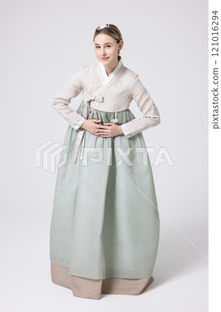A foreign woman wearing traditional Korean hanbok and greeting people 121016294