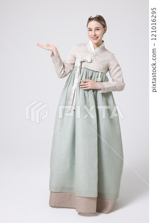 A foreign woman wearing traditional Korean hanbok A foreign woman wearing traditional Korean hanbok 121016295